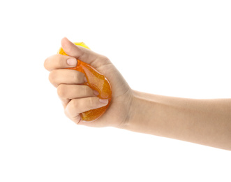 Woman playing with orange slime isolated on white, closeup. Antistress toy