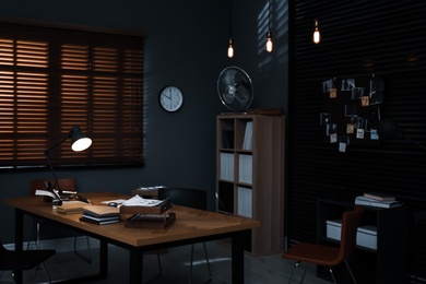 Detective office interior with evidence board on wall