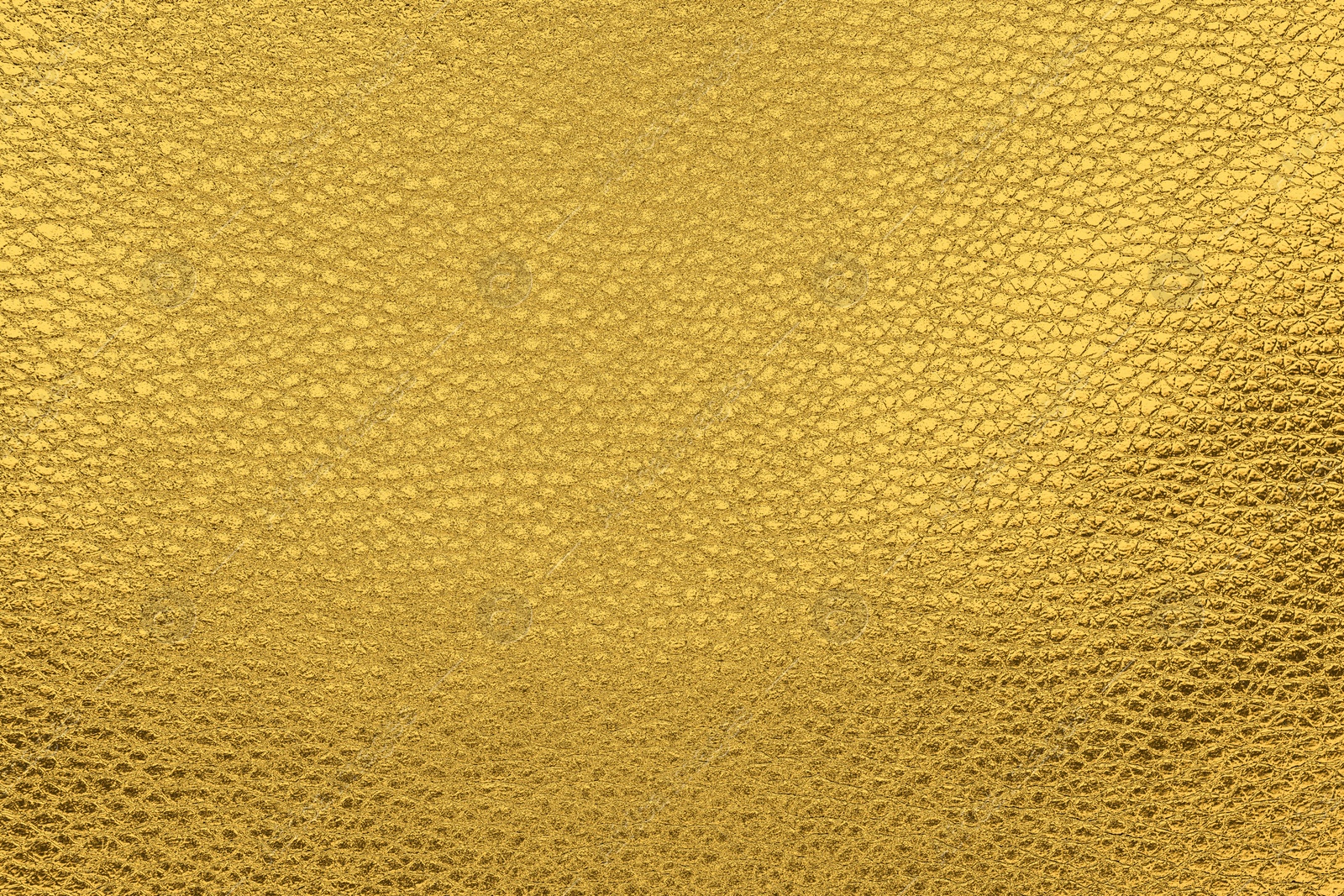 Image of Golden textured surface as background, closeup view