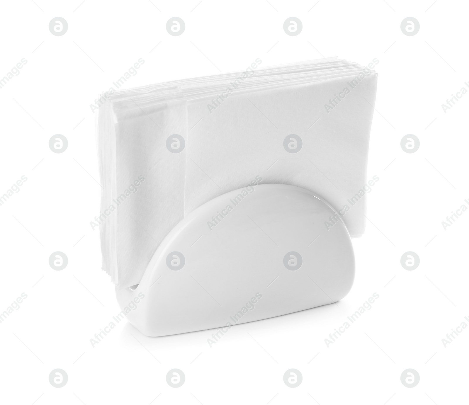 Photo of Ceramic napkin holder with paper serviettes on white background