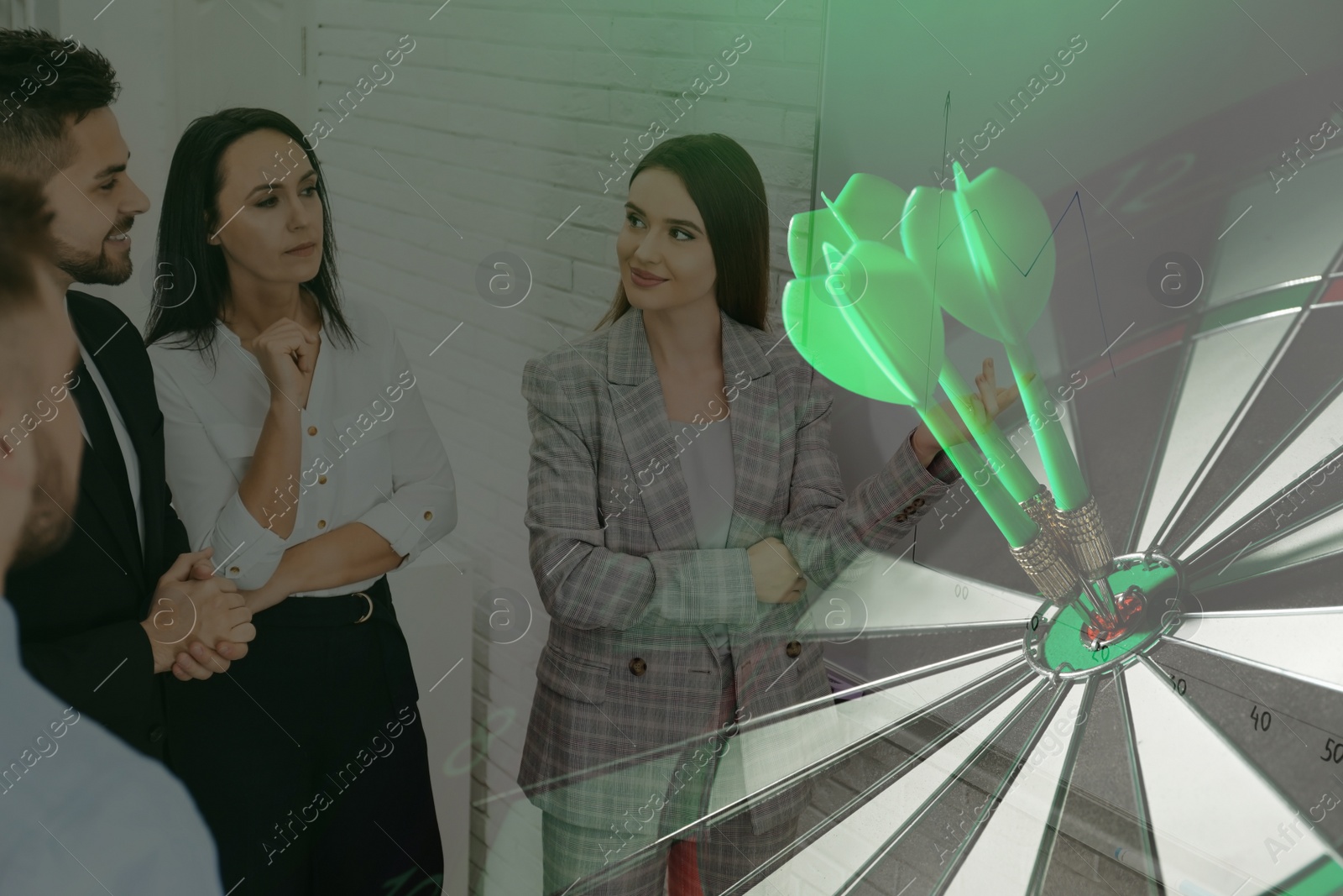 Image of People having business meeting and dart board with arrows. Double exposure