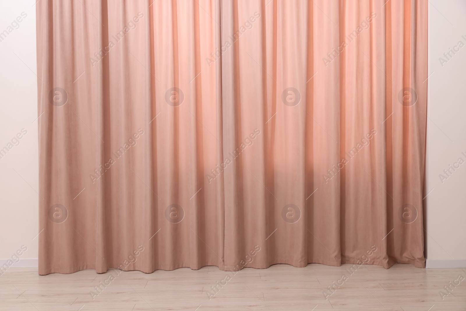 Photo of Elegant window curtains in room. Interior design