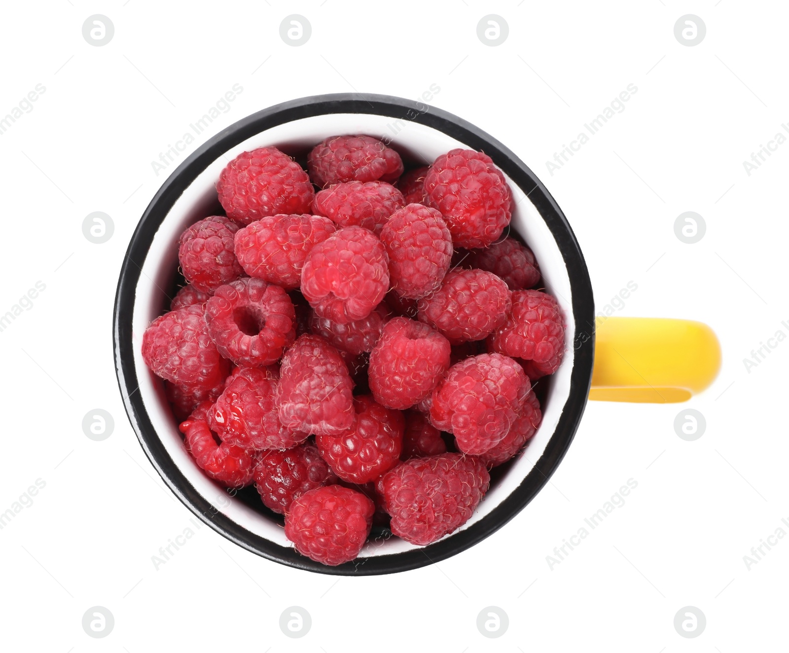 Photo of Mug with ripe raspberries on white background, top view