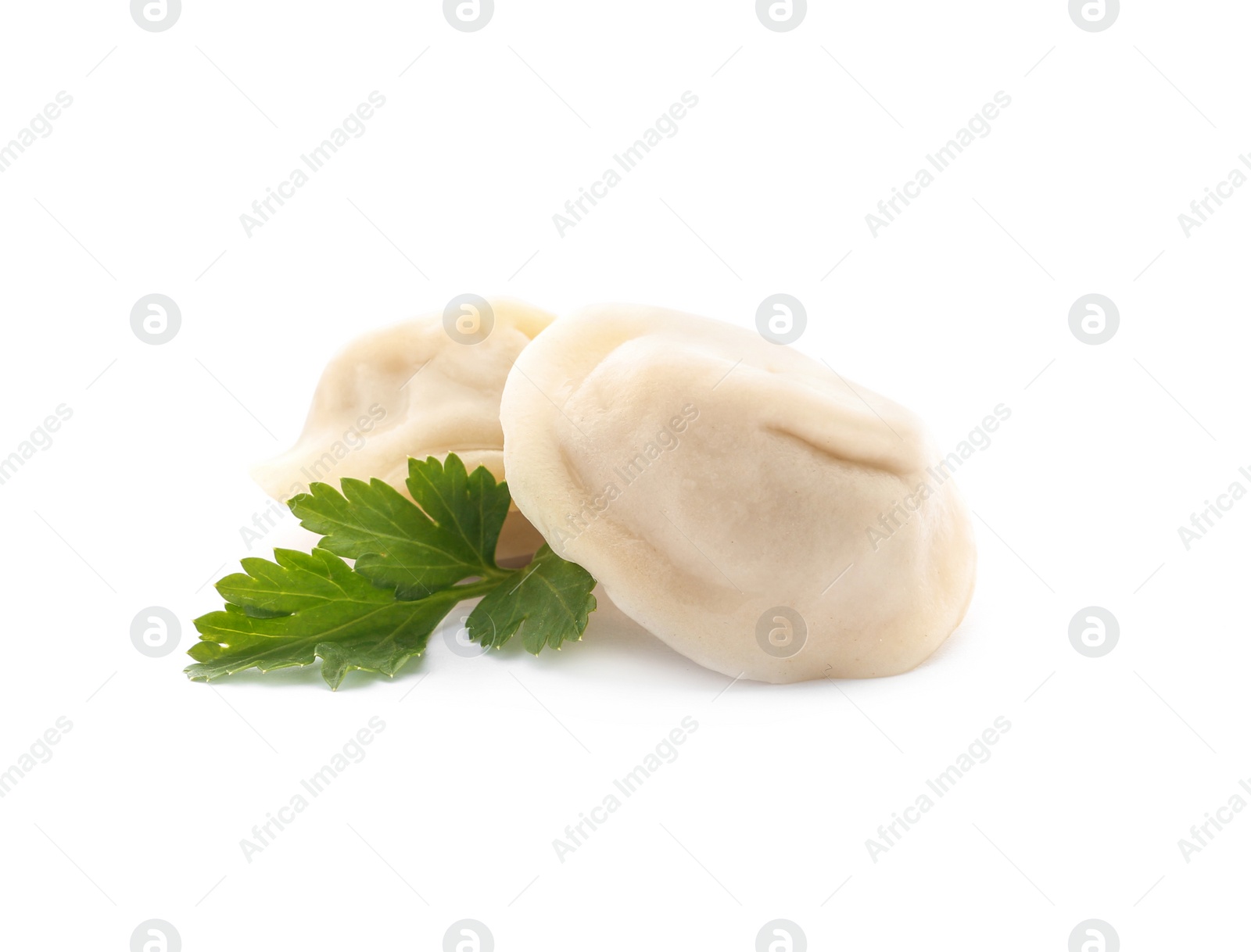 Photo of Fresh boiled dumplings and parsley leaf on white background