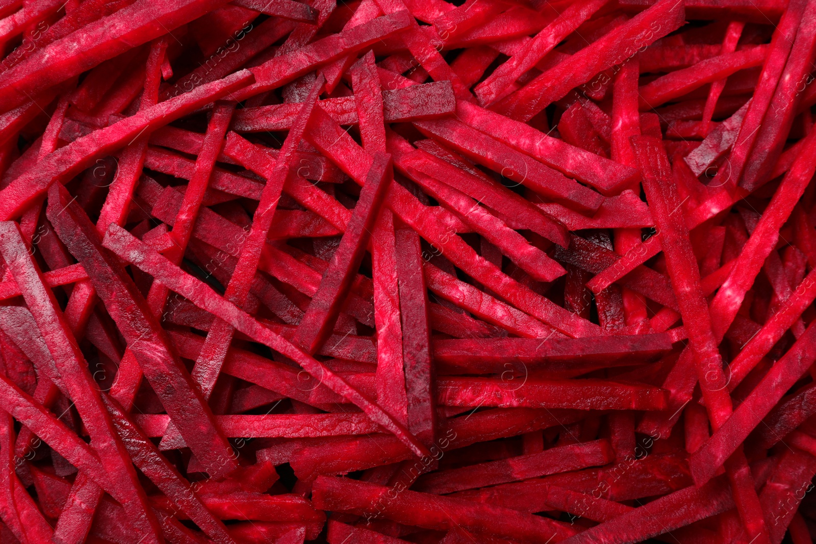 Photo of Cut beets as background. Backdrop for design