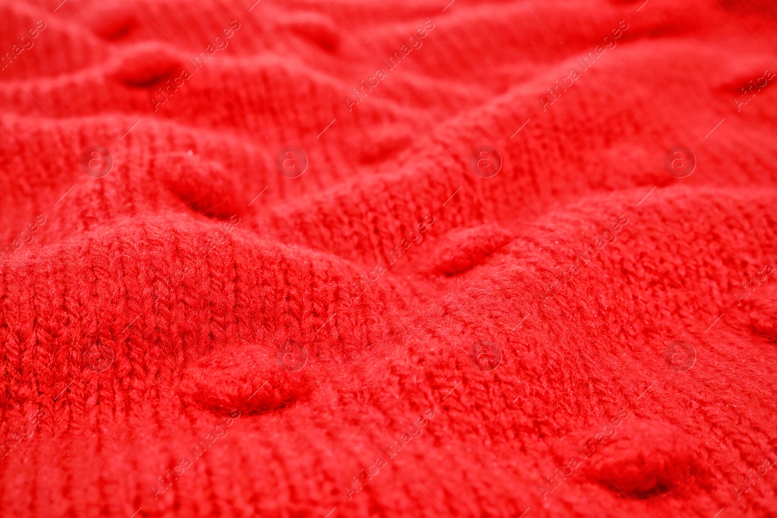 Photo of Texture of cozy warm sweater as background, closeup