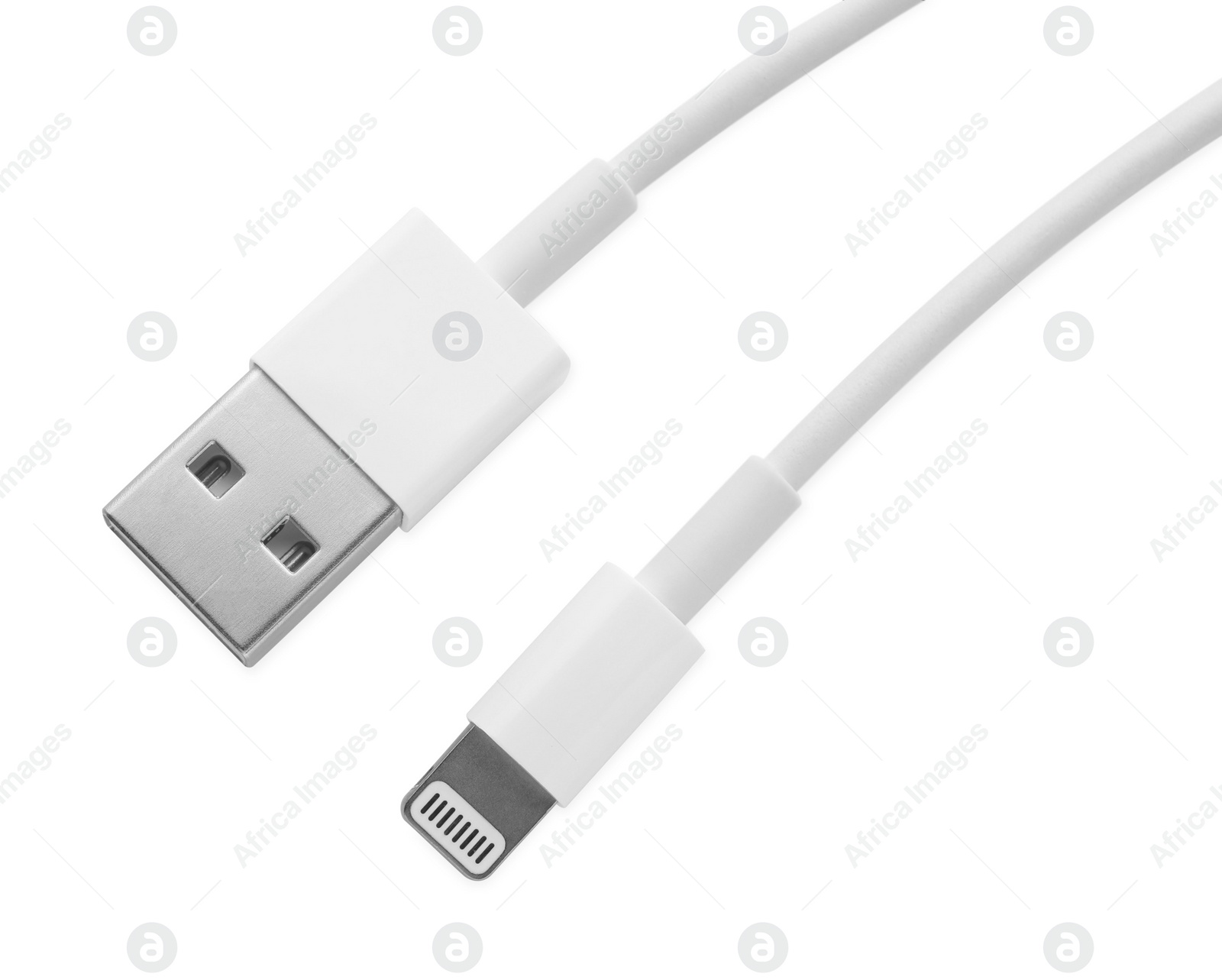 Photo of USB to lightning cable isolated on white, top view. Modern technology