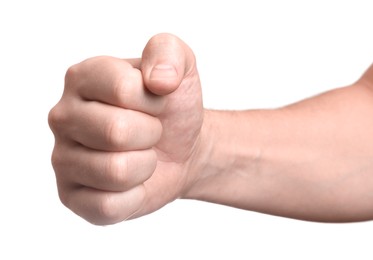 Man showing fist on white background, closeup