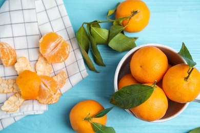 Photo of Flat lay composition with fresh ripe tangerines on wooden background