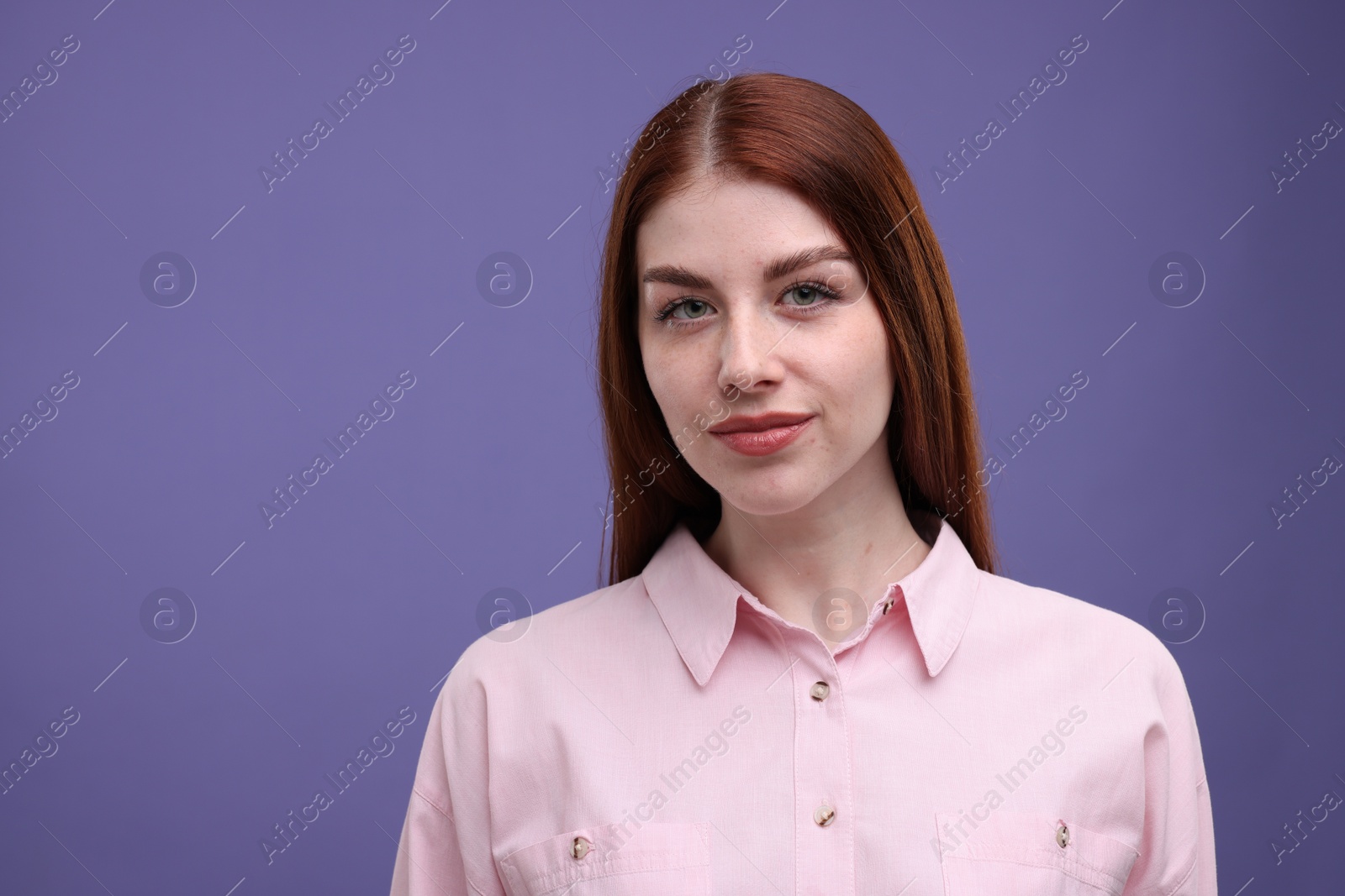 Photo of Portrait of beautiful woman on purple background. Space for text