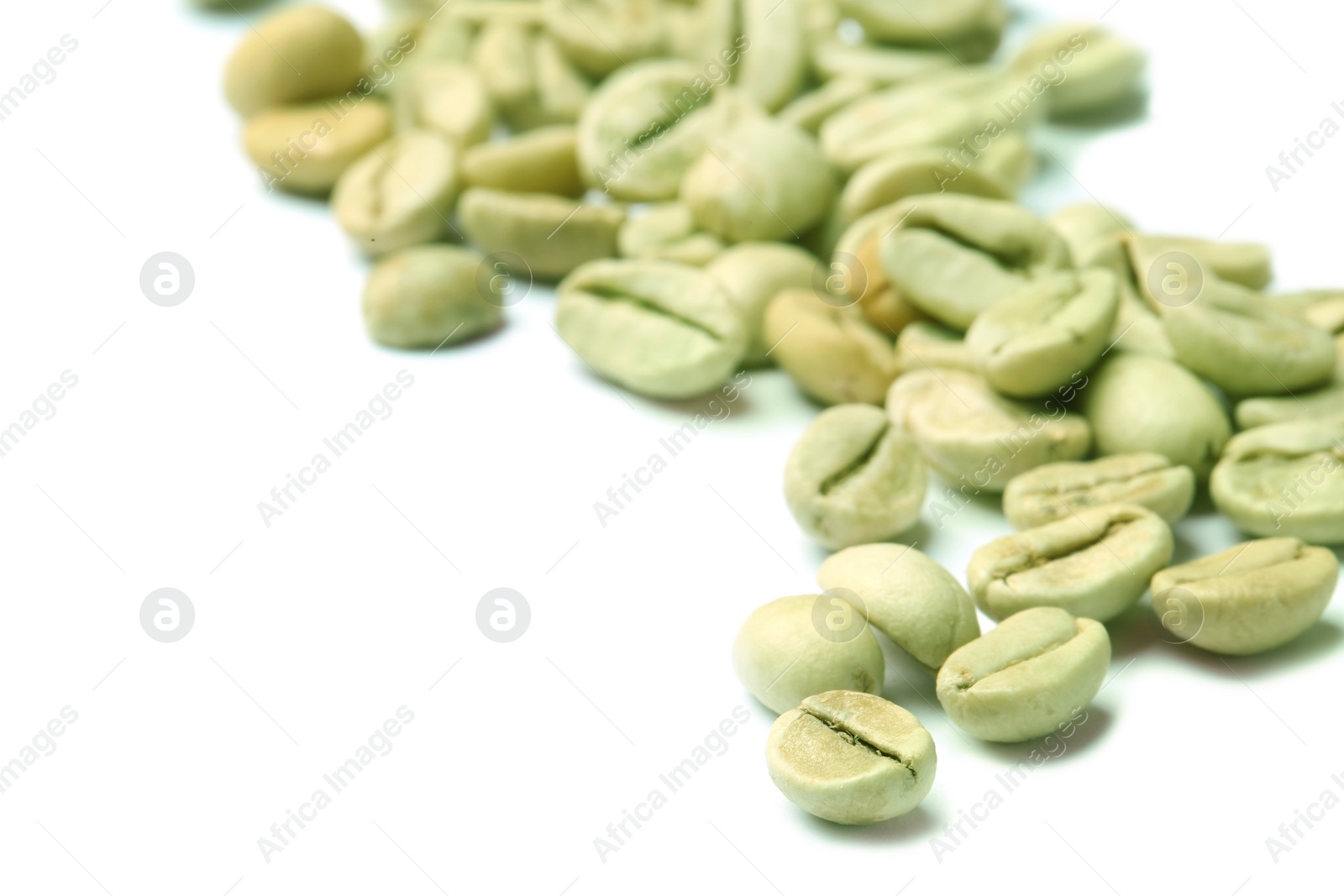 Photo of Green coffee beans and space for text on white background