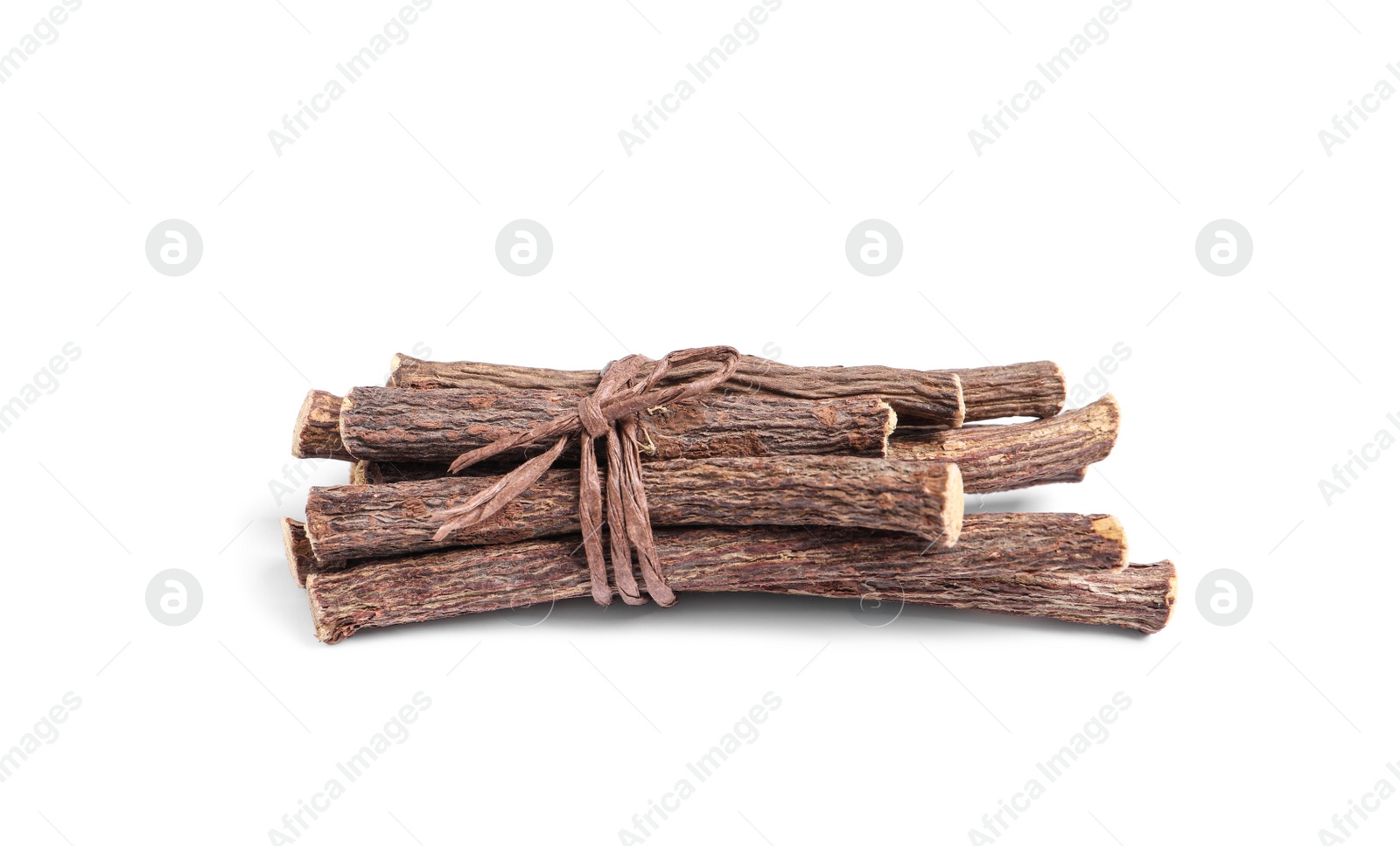 Photo of Dried sticks of liquorice root on white background