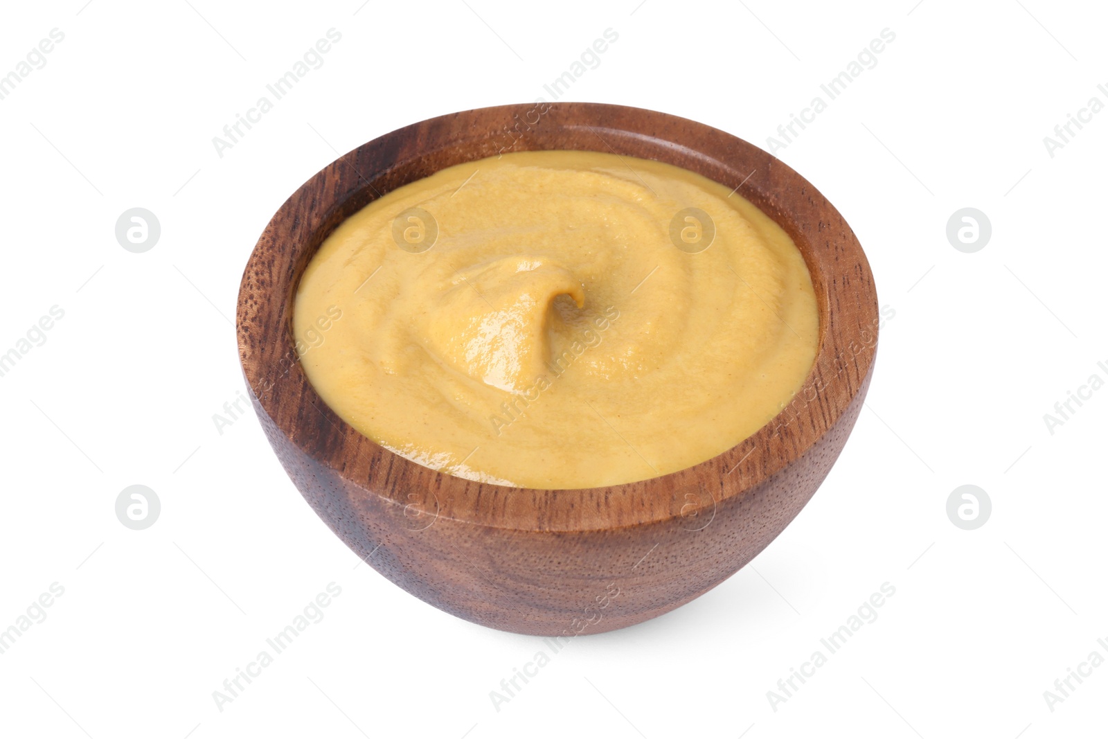 Photo of Fresh tasty mustard sauce in wooden bowl isolated on white