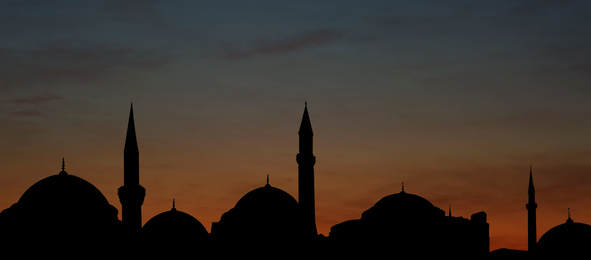 Image of Silhouette of mosque during sunset, banner design. Muslim culture 