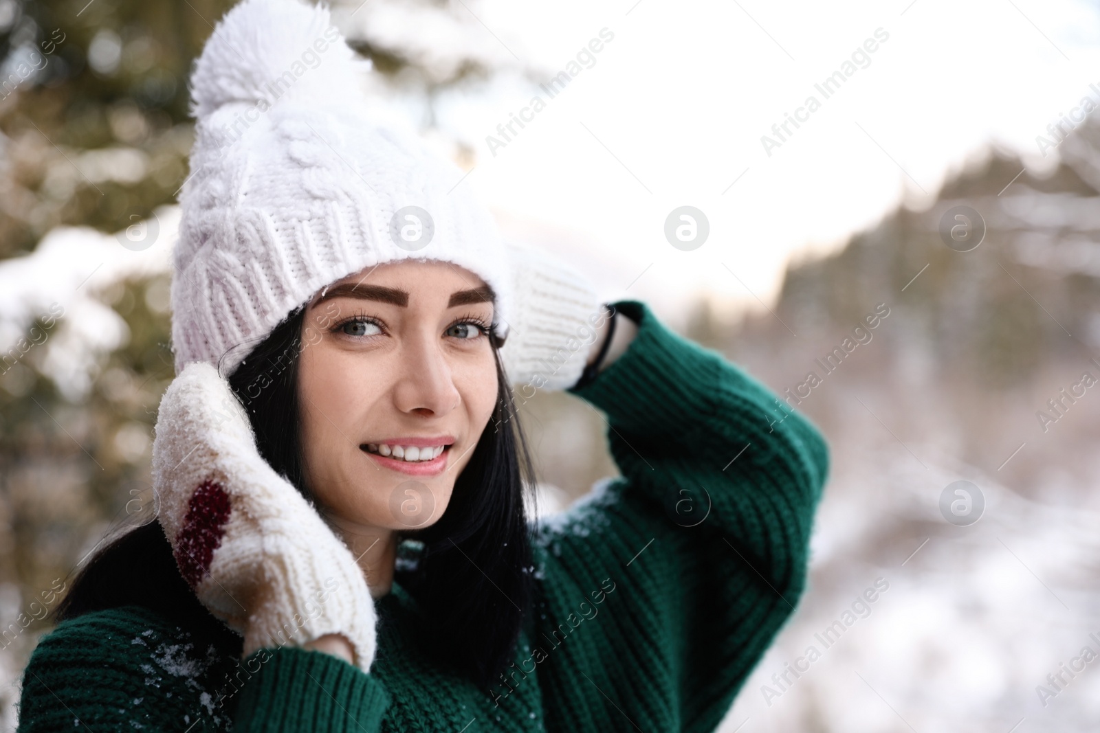 Photo of Portrait of beautiful young woman on winter day