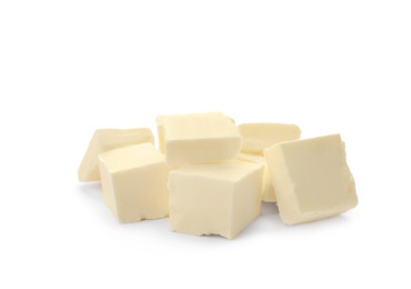 Photo of Cubes of tasty fresh butter on white background