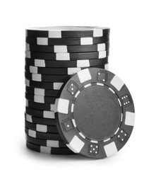 Photo of Black casino chips stacked on white background. Poker game