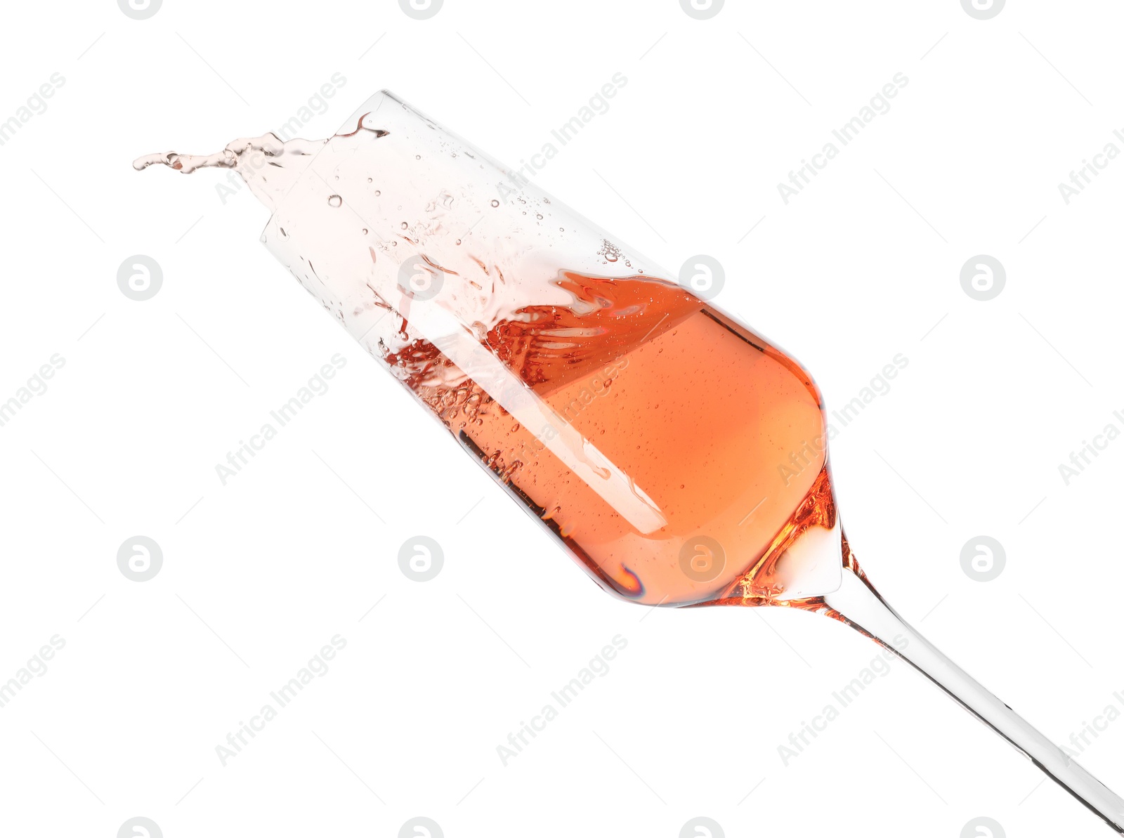 Photo of Glass of rose champagne isolated on white