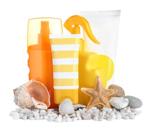Photo of Different suntan products, seashells, starfish and stones on white background