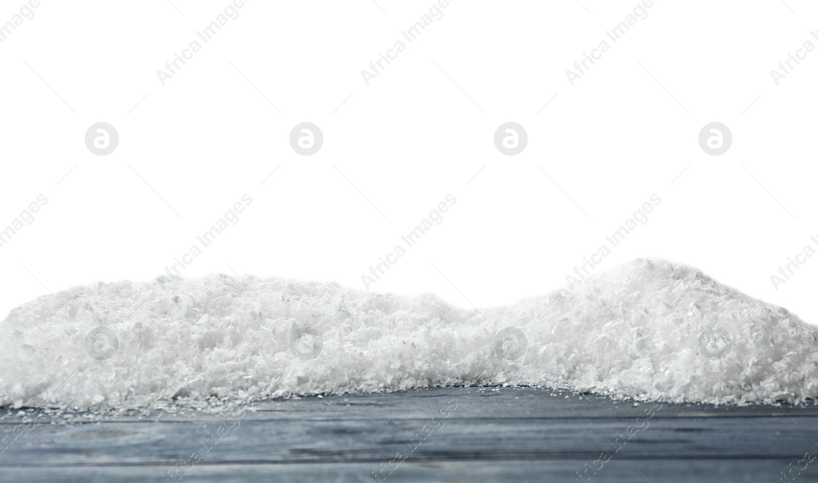 Photo of Wooden surface covered with snow against white background