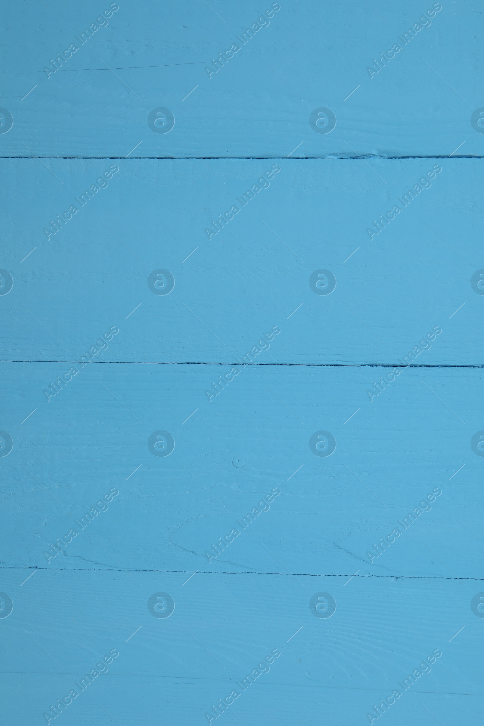 Photo of Texture of light blue wooden surface as background, closeup