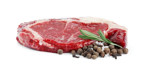 Photo of Piece of fresh beef meat, rosemary and spices on white background