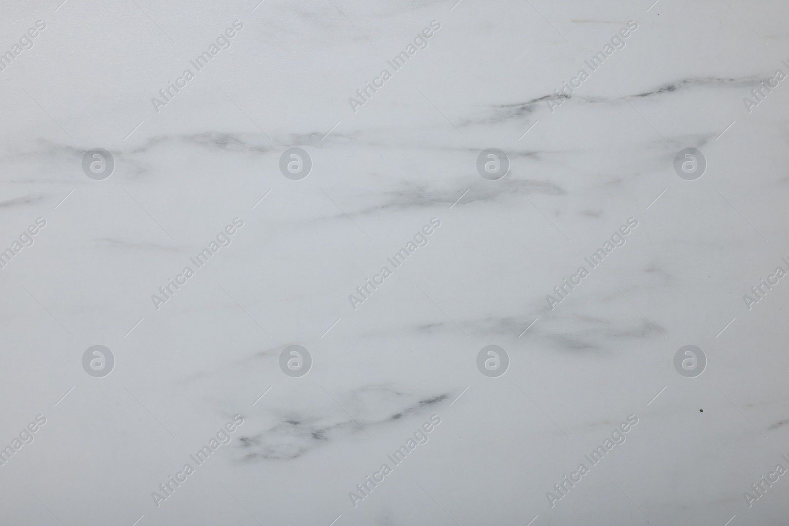 Photo of Texture of white marble surface as background, closeup