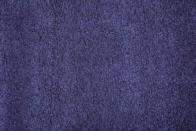 Soft indigo carpet as background, top view