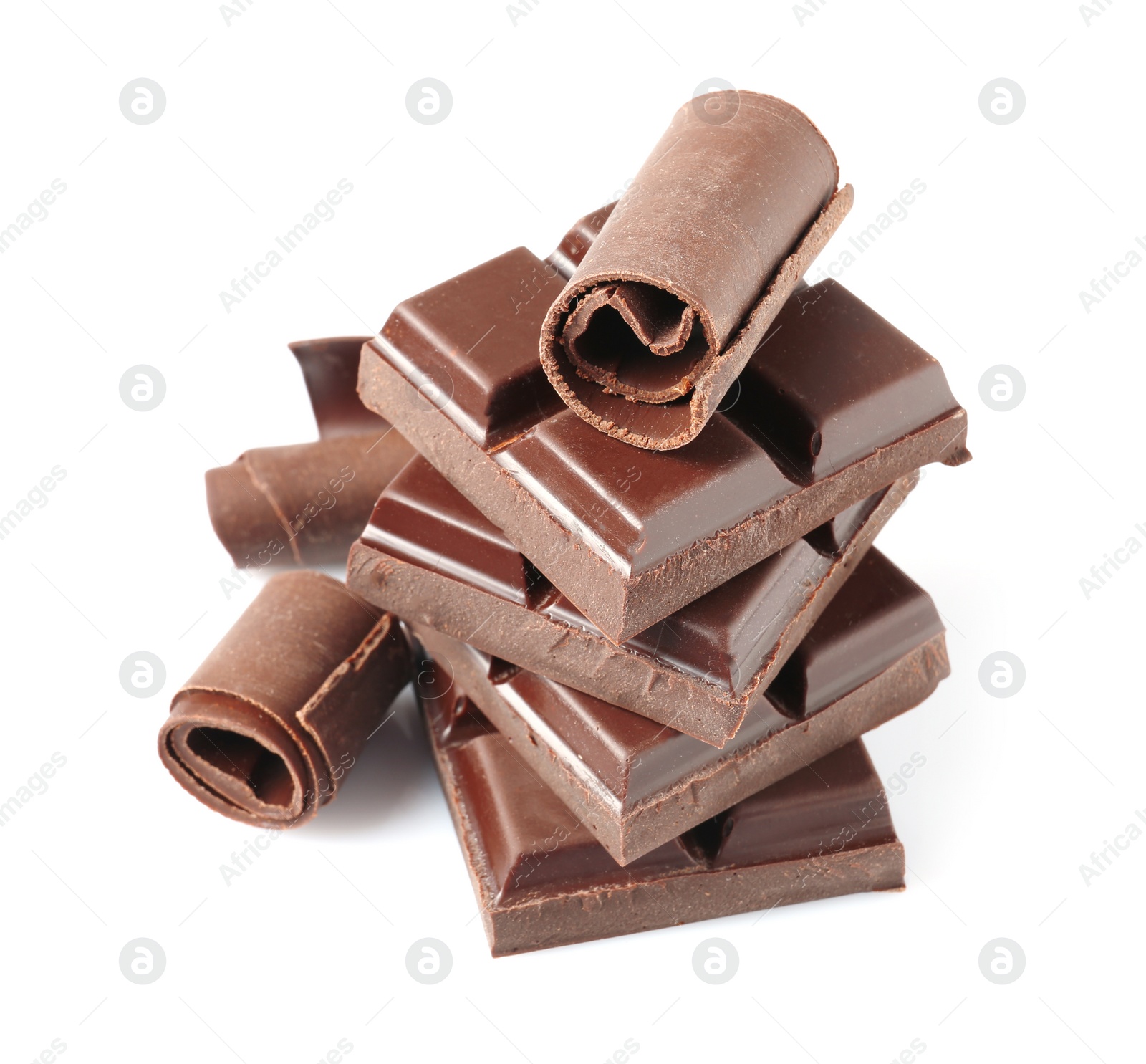 Photo of Yummy chocolate curls and pieces on white background