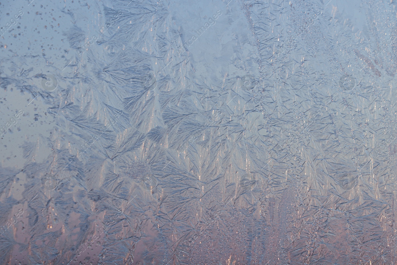 Photo of Beautiful frosty window as background, closeup. Winter morning