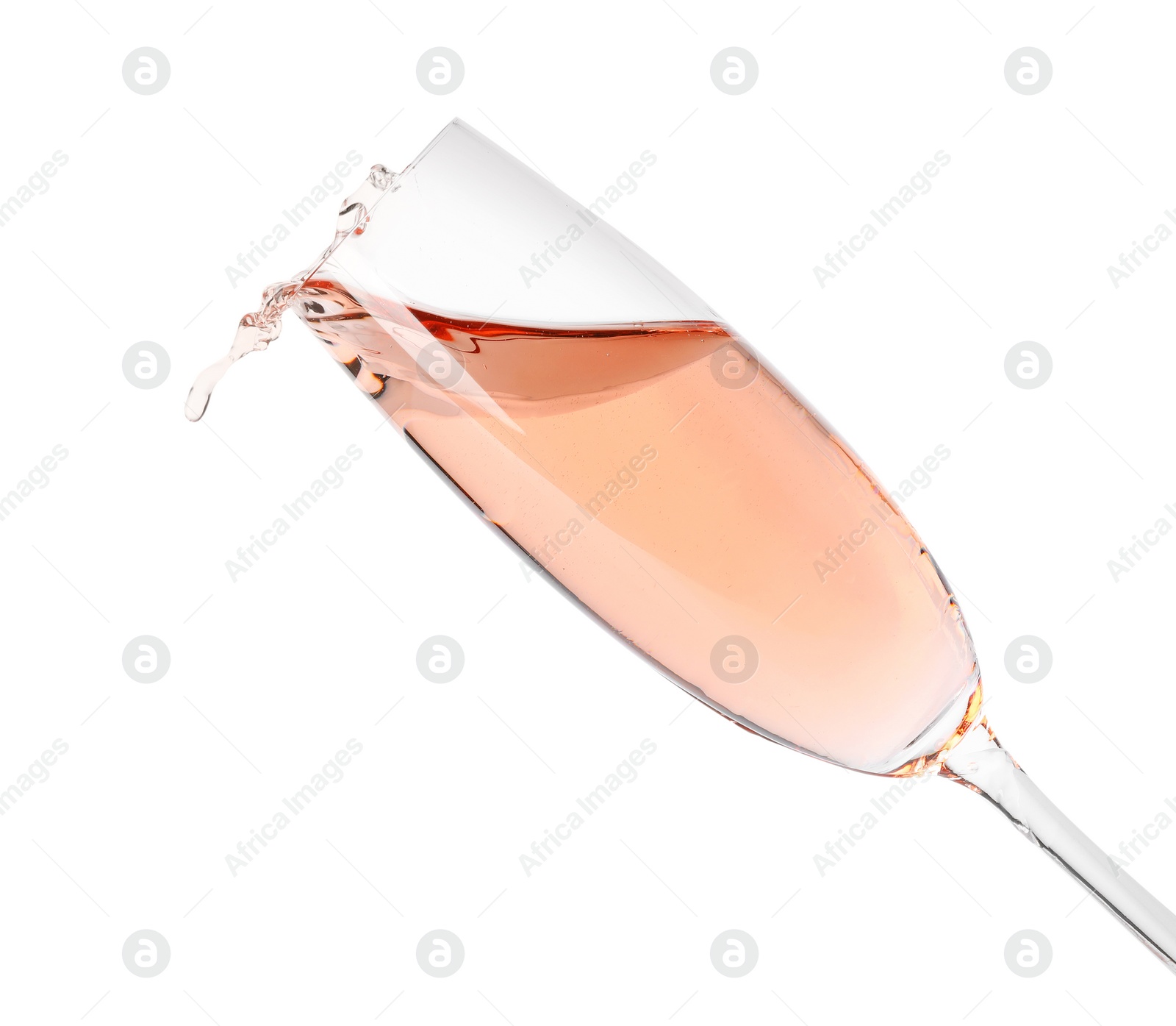 Photo of Glass of rose champagne isolated on white