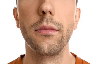 Young man on white background, closeup view