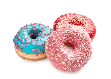 Photo of Delicious glazed doughnuts with sprinkles on white background