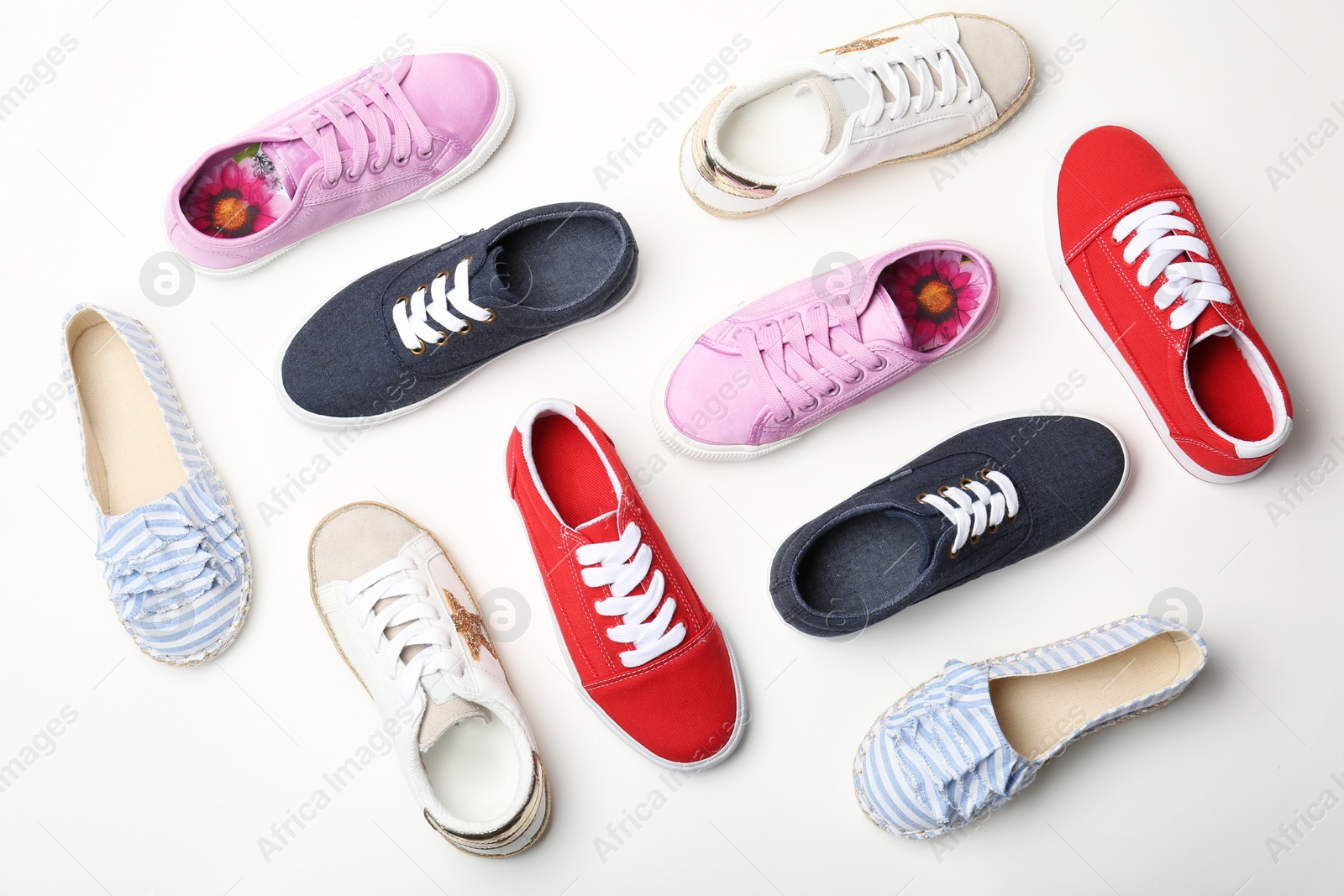 Photo of Flat lay composition with stylish new shoes on white background