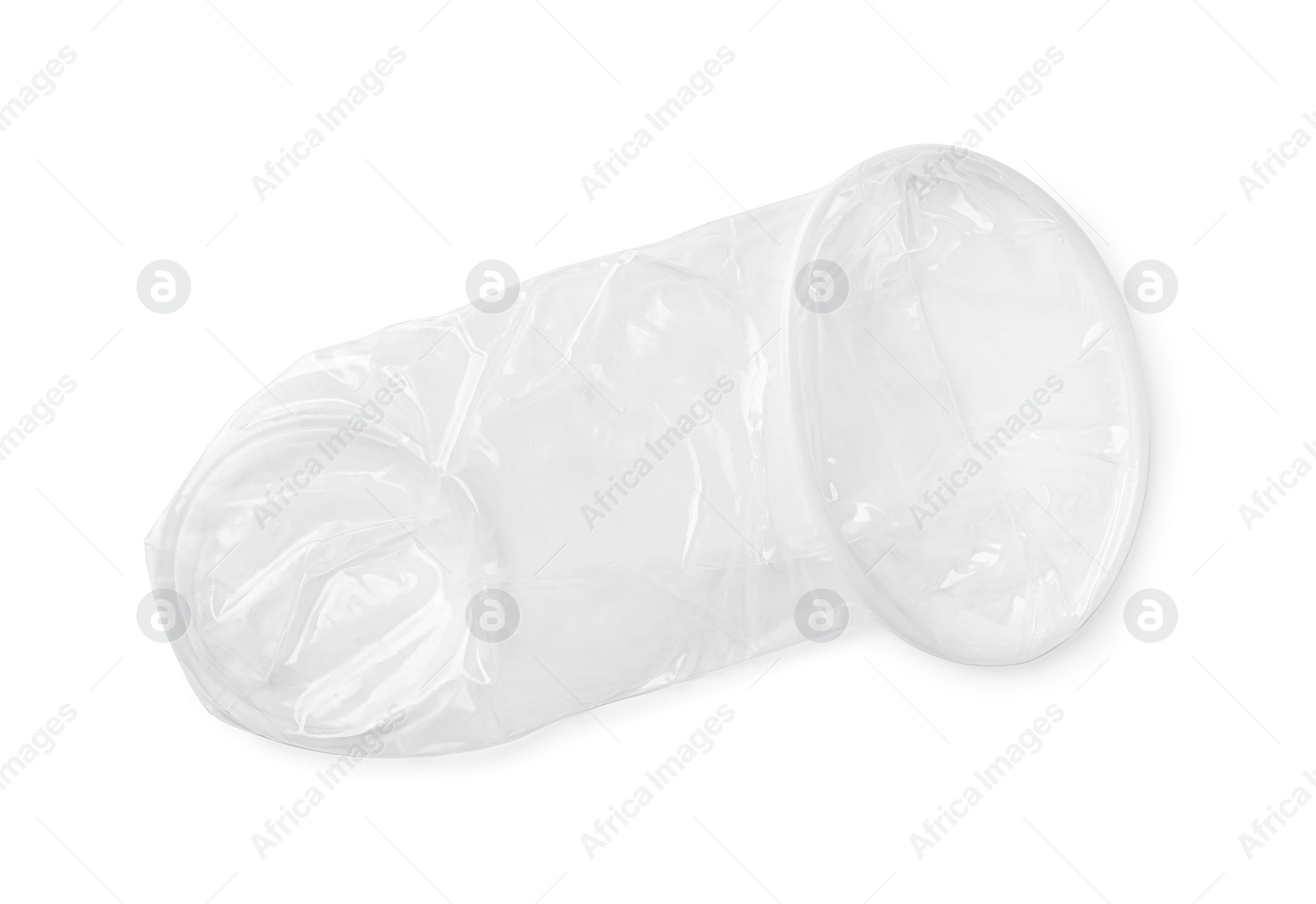 Photo of Unrolled female condom isolated on white, top view. Safe sex