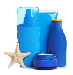 Composition with sun protection cosmetic products and starfish on white background