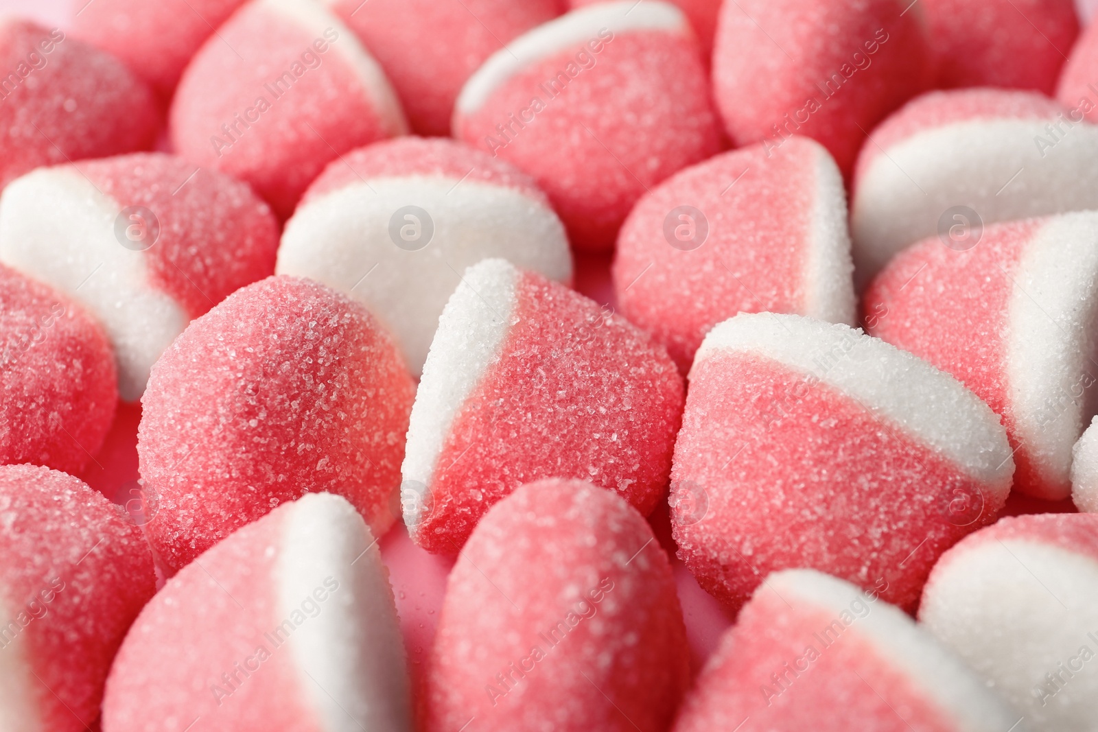 Photo of Closeup of sweet color jelly candies as background