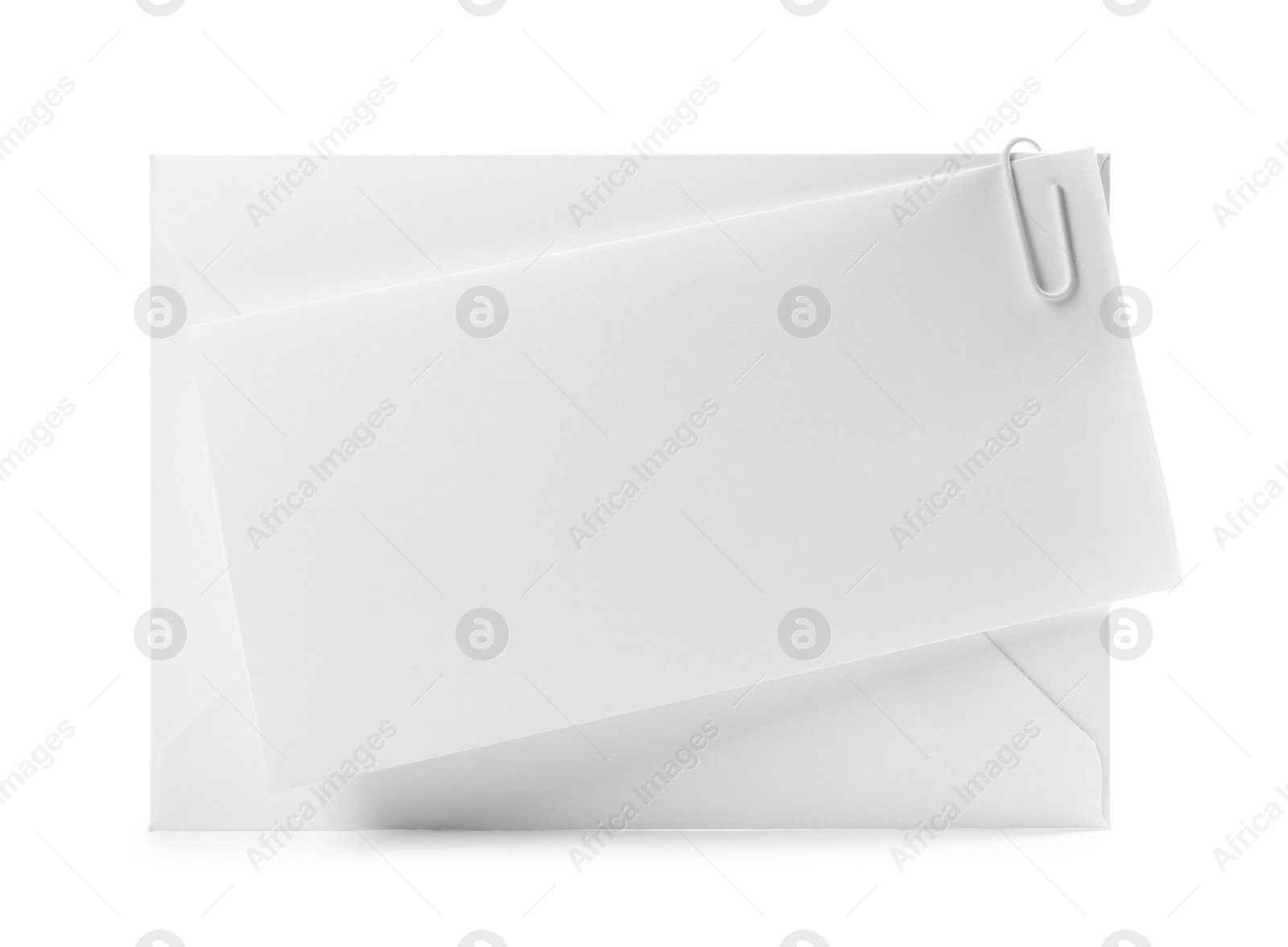 Photo of Blank card and letter envelope on white background