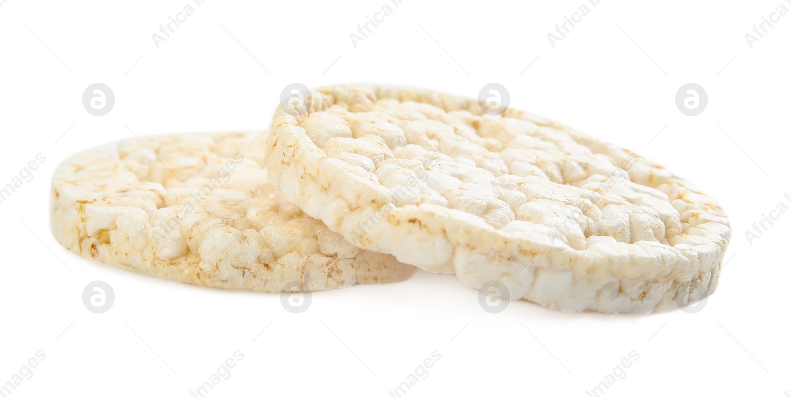 Photo of Puffed rice cakes isolated on white. Healthy snack