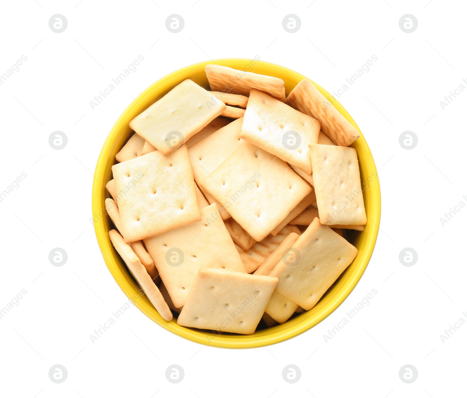 Photo of Delicious crackers in bowl isolated on white, top view