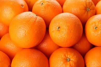Photo of Fresh ripe oranges as background, top view