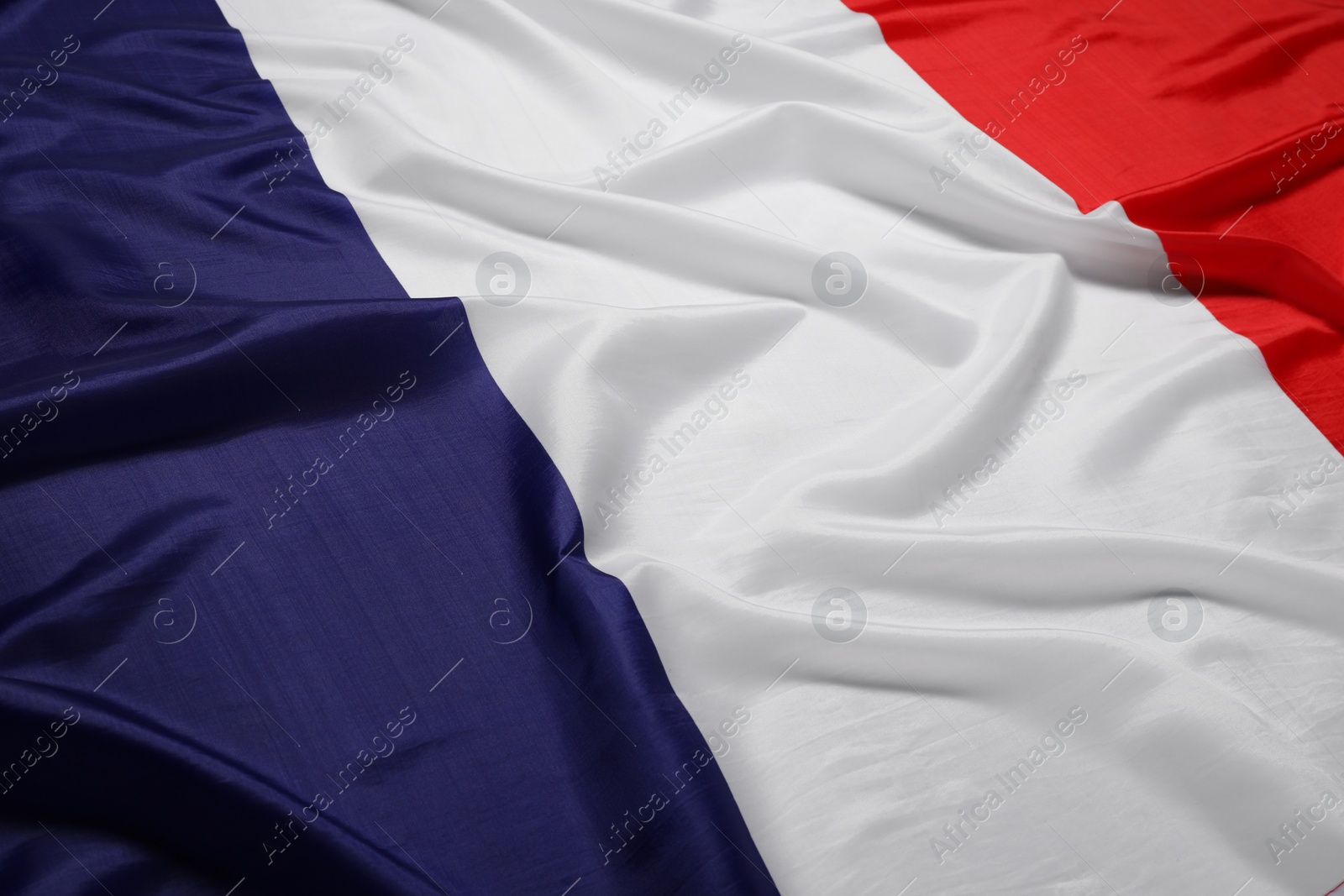 Photo of Flag of France as background, closeup. National symbol