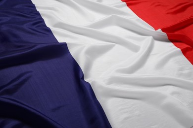 Photo of Flag of France as background, closeup. National symbol