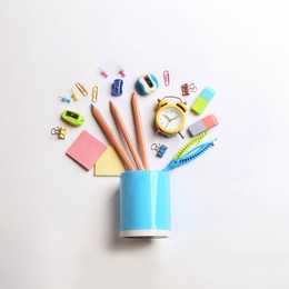 Image of Flat lay composition with school stationery on white background. Back to school
