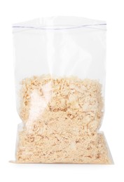 Photo of Natural sawdust in zip bag isolated on white