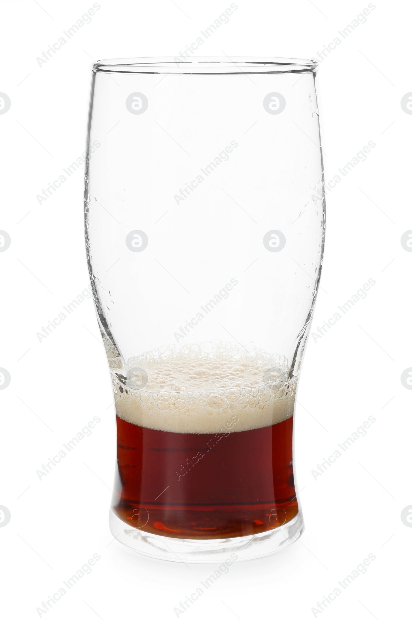 Photo of Almost empty glass of beer isolated on white