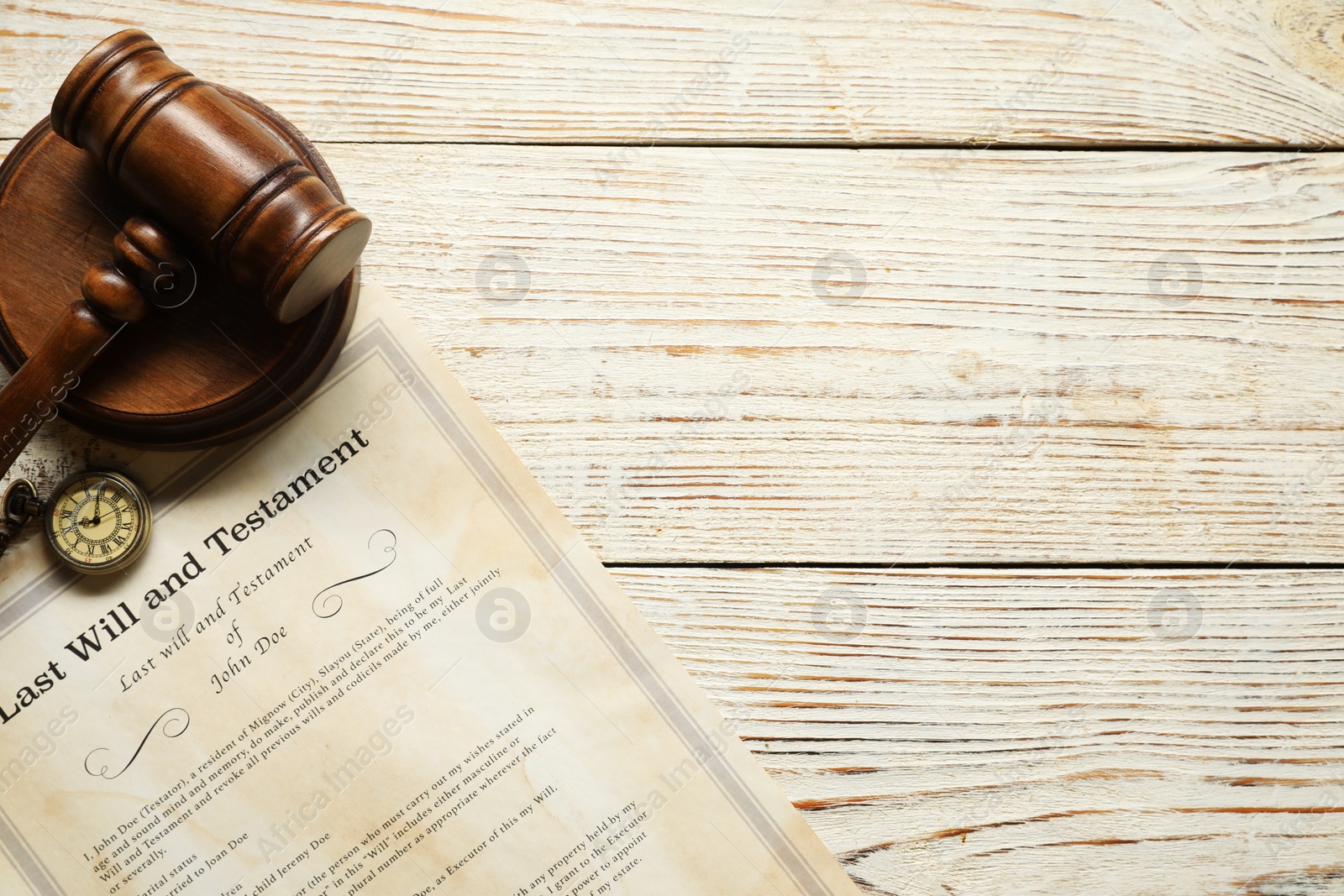 Photo of Last Will and Testament, pocket watch and gavel on white wooden table, flat lay. Space for text