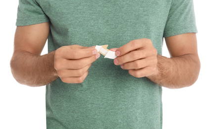 Photo of Man with sticking plaster on white background, closeup