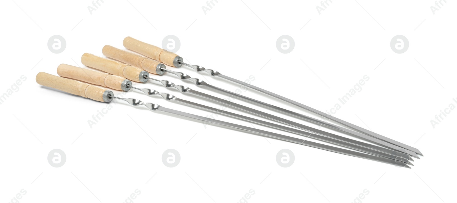 Photo of Metal skewers with wooden handle on white background