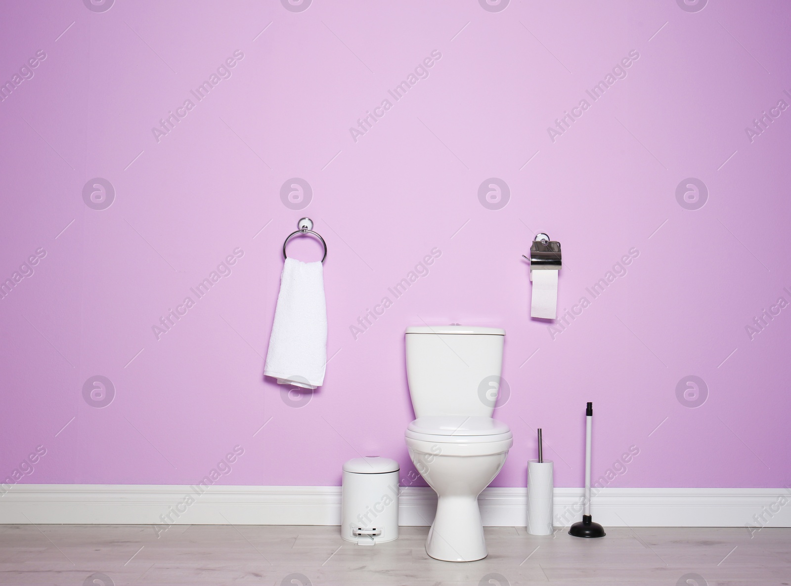 Photo of New ceramic toilet bowl in modern bathroom